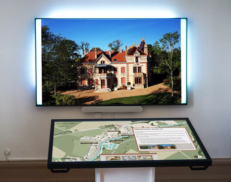 tactile table and large screen showcased in the Villa Perrusson, a museum in France